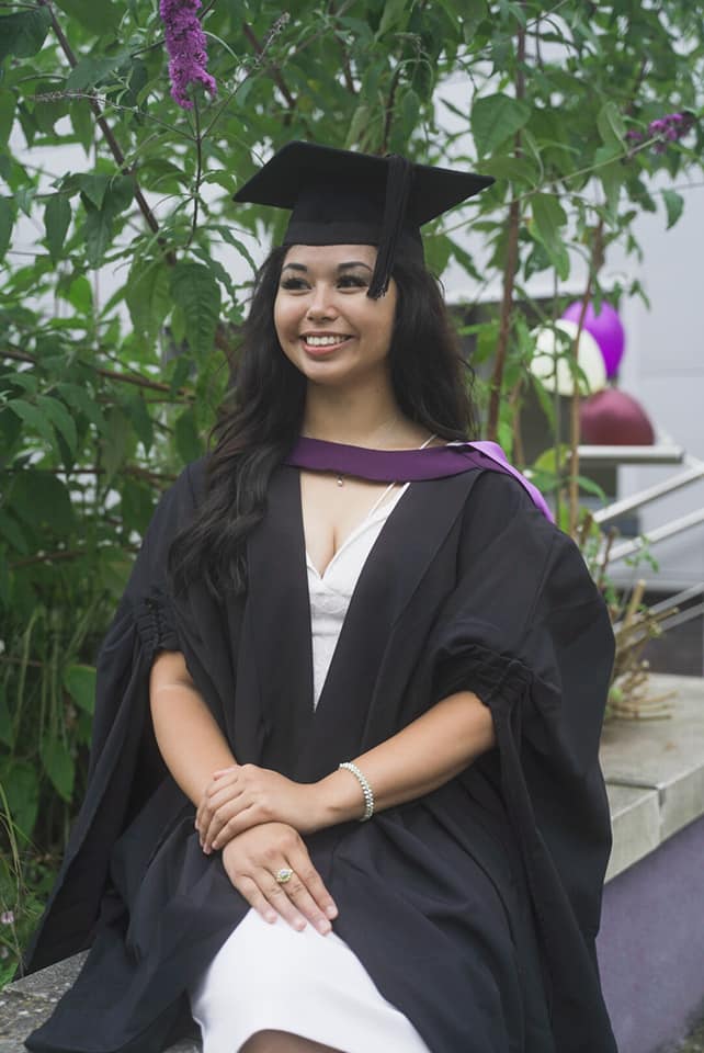 woman in graduate gown